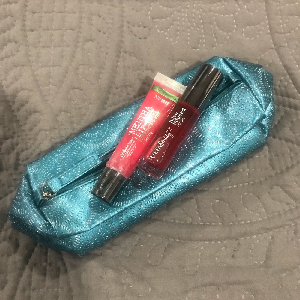 Brand new, Two lip glosses and a gift bag!